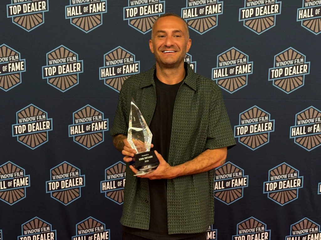 Erik Devash holding his 2026 Window Film Hall of Fame award